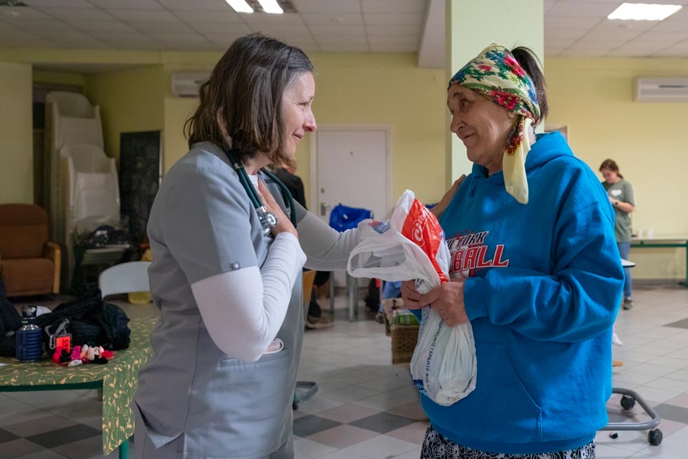 Doctor helping with patient in moldova clinic